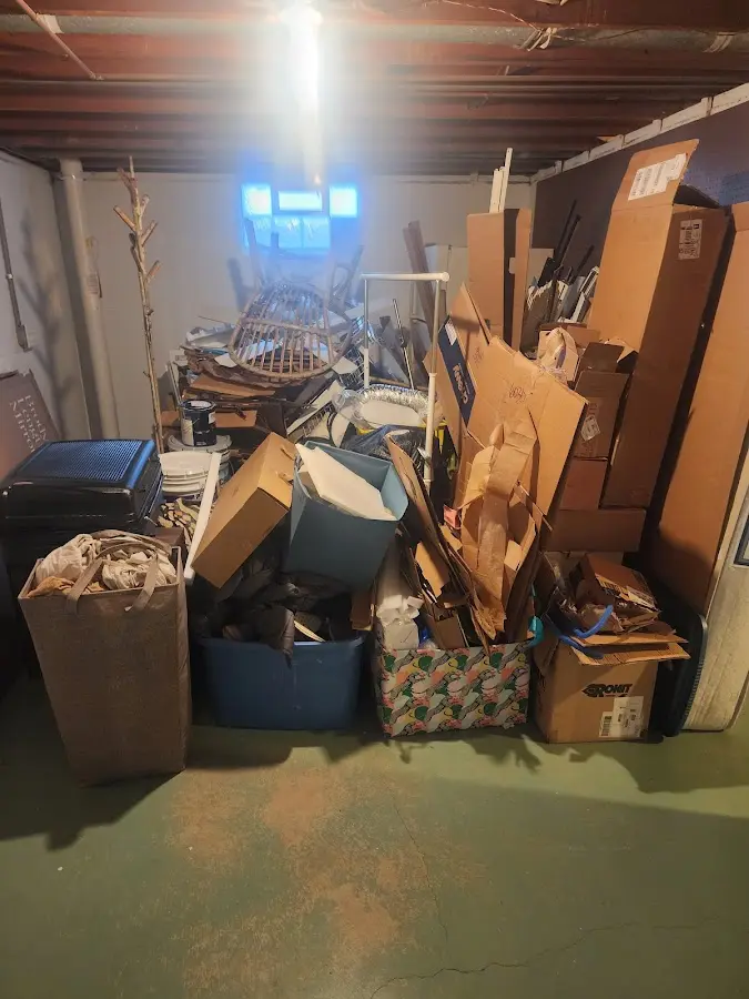 Roll-off dumpster container at job site for 8 Yard Dumpster Rental in Hot Springs